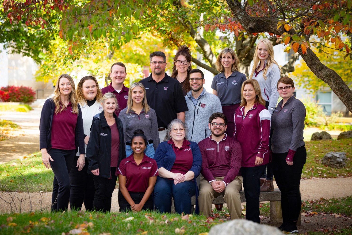 The Career Center staff gathers for a photo on an autumn day on the Missouri State University campus.