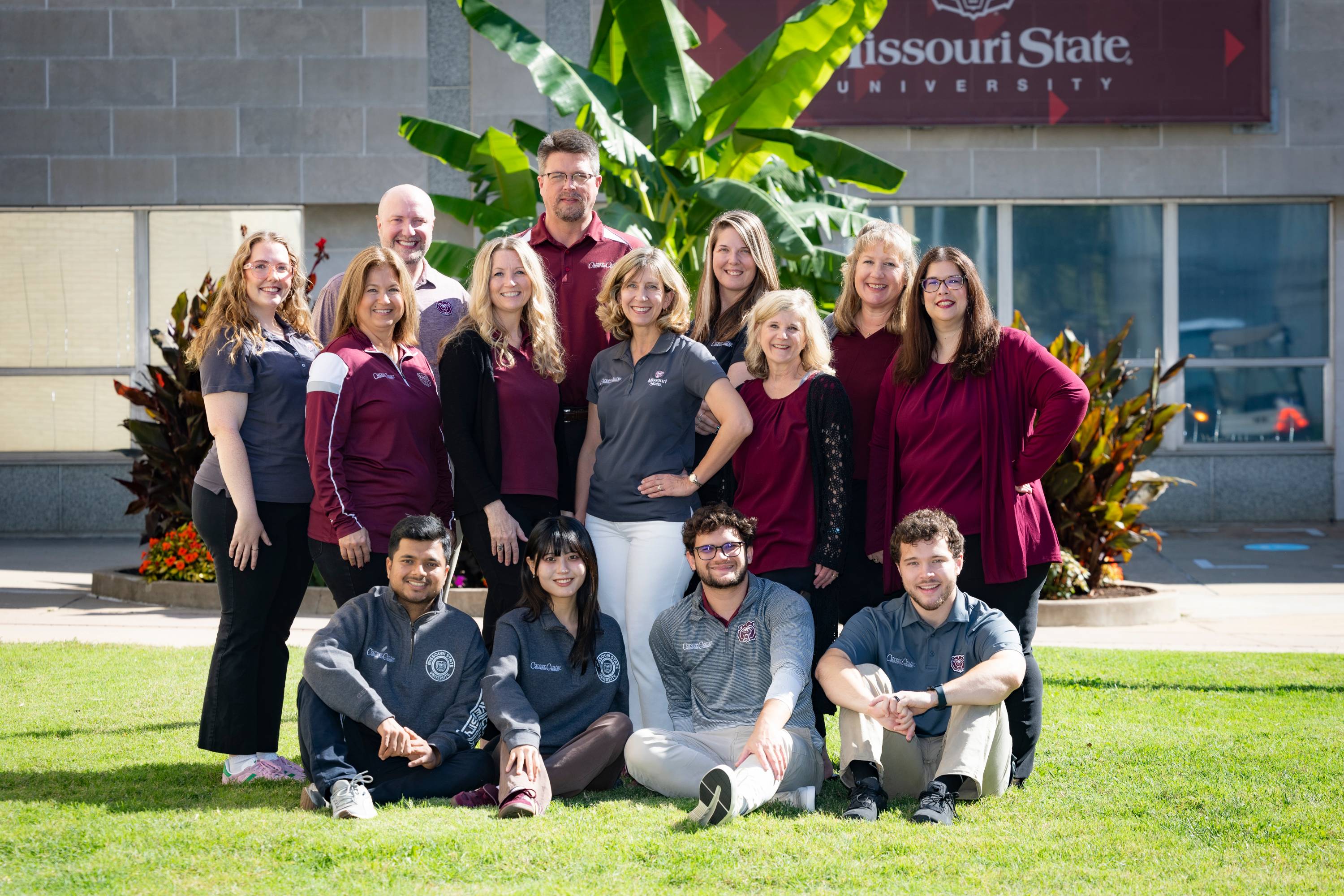 The Career Center staff gathers for a photo on an autumn day on the Missouri State University campus.
