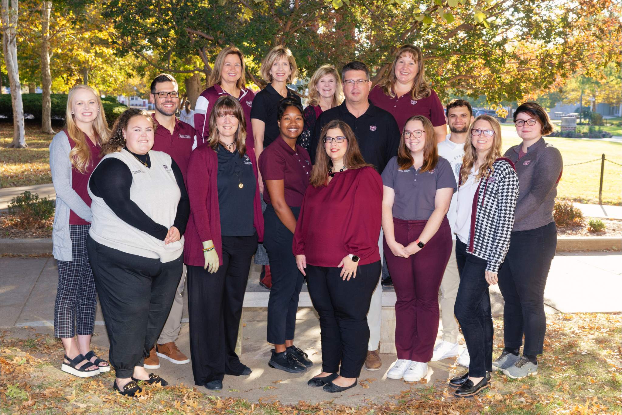 The Career Center staff poses for a photo on a beautiful autumn day on campus